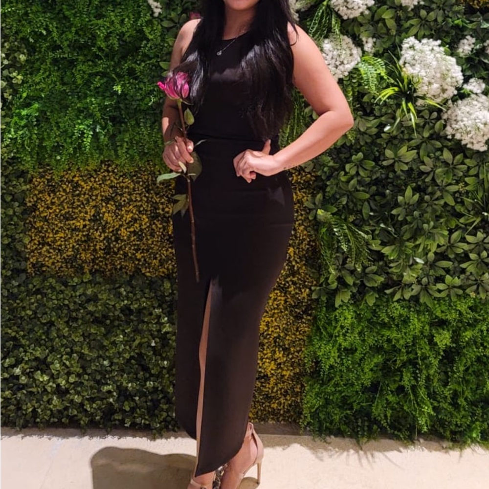 Black midi dress with open back and adjust beautiful to your body.